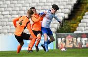 27 April 2019; Scott Forest, Blarney United, in action against Jack Tynan, left, and Talor Dolan, centre, St. Kevin's Boys during the FAI Under-17 Cup Final match between St Kevin’s Boys and Blarney United at Dalymount Park in Dublin. Photo by Barry Cregg/Sportsfile
