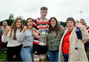 28 April 2019; Kicker of the winning penalty, Nick Doyle of Enniscorthy RFC, celebrates with the cup and family members, from left, Sarah Doyle, Trish Doyle, Helena Dolye and Marie Doyle, following the Bank of Ireland Provincial Towns Cup final match between Enniscorthy RFC and Wicklow RFC at Navan RFC in Navan. Photo by Sam Barnes/Sportsfile