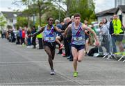 28 April 2019; Paul O'Donnell, front, and Hiko Haso Tonosa of Dundrum South Dublin AC, Dublin, during their change over as the compete in senior men's event during the AAI National Road Relays in Raheny, Dublin. Photo by Piaras Ó Mídheach/Sportsfile