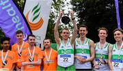 28 April 2019; Runners from Raheny Shamrock AC, Dublin, from left, Kieran Kelly, Cillian Kirwan, Kevin Dooney, and Brian Fay, after winning the senior men's event, alongside third placed runners from Clonliffe Harriers A.C., Dublin, left, from left, Efrem Gidey, Cathal Doyle, Stephen Scullion, and Colm Rooney, during the AAI National Road Relays in Raheny, Dublin. Photo by Piaras Ó Mídheach/Sportsfile