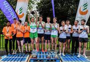 28 April 2019; Runners from Raheny Shamrock AC, Dublin, centre, from left, Kieran Kelly, Cillian Kirwan, Kevin Dooney, and Brian Fay, after winning the senior men's event, alongside third placed runners from Clonliffe Harriers A.C., Dublin, left, from left, Efrem Gidey, Cathal Doyle, Stephen Scullion, and Colm Rooney, and second placed runners from Donore Harriers, Dublin, right, from left, John Travers Eric Keogh, Daragh Fitzgibbon, Louis O'Loughlin, during the AAI National Road Relays in Raheny, Dublin. Photo by Piaras Ó Mídheach/Sportsfile