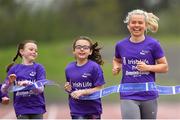 29 April 2019; Sprinter Molly Scott with Raheny Shamrock A.C. members 11 year old Chloe Rogers, left, and 8 year old Lucy Rogers, during the launch of the Irish Life Health Athletics Summer Camp in Morton Stadium in Santry, Dublin. Run, Jump and Throw at the Irish Life Health Athletics Summer Camps! Photo by Ramsey Cardy/Sportsfile