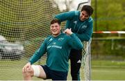 29 April 2019; Jack O’Donoghue, left, gets assistance with his GPS device from team-mate Joey Carbery prior to Munster Rugby squad training at the University of Limerick in Limerick. Photo by Diarmuid Greene/Sportsfile