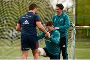 29 April 2019; Jack O’Donoghue, centre, with Rhys Marshall, left, as he gets assistance with his GPS device from Joey Carbery prior to Munster Rugby squad training at the University of Limerick in Limerick. Photo by Diarmuid Greene/Sportsfile