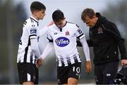 29 April 2019; Jamie McGrath of Dundalk, centre, alongside team-mate Seán Gannon, leaves the field after picking up an injury during the SSE Airtricity League Premier Division match between Waterford and Dundalk at the RSC in Waterford. Photo by Piaras Ó Mídheach/Sportsfile