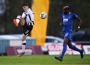 29 April 2019; Seán Gannon of Dundalk in action against Ismahil Akinade of Waterford during the SSE Airtricity League Premier Division match between Waterford and Dundalk at the RSC in Waterford. Photo by Piaras Ó Mídheach/Sportsfile