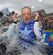 1 May 2019; Ruby Walsh is soaked by fellow jockeys after he announced his retirement after he rode Kemboy to win The Coral Punchestown Gold Cup during the Punchestown Festival Gold Cup Day at Punchestown Racecourse in Naas, Kildare. Photo by David Fitzgerald/Sportsfile