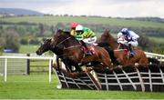 2 May 2019; Unowhatimeanharry, with Mark Walsh up, (9), jump the last ahead of Killultagh Vic, with David Mullins up, right, and Vision Des Flos, with Tom Scudamore up, on their way to winning the Ladbrokes Champion Stayers Hurdle at Punchestown Racecourse in Naas, Kildare. Photo by David Fitzgerald/Sportsfile