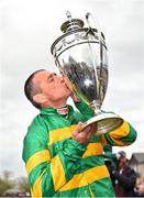 3 May 2019; Jockey Davy Russell kisses the trophy after winning the BETDAQ Punchestown Champion Hurdle on Buveur D'air at Punchestown Racecourse in Naas, Kildare. Photo by Seb Daly/Sportsfile
