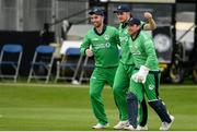 3 May 2019; Mark Adair of Ireland, centre, celebrates a catch with Andrew Balbirnie, left and Gary Wilson, right during the One Day International between Ireland and England at Malahide Cricket Ground in Dublin. Photo by Sam Barnes/Sportsfile