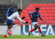 3 May 2019; Nathanaël Mbuku of France in action against Noni Madueke of England during the 2019 UEFA European Under-17 Championships Group B match between England and France at City Calling Stadium in Longford. Photo by Eóin Noonan/Sportsfile