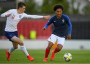 3 May 2019; Enzo Milot of France in action against Jensen Weir of England during the 2019 UEFA European Under-17 Championships Group B match between England and France at City Calling Stadium in Longford. Photo by Eóin Noonan/Sportsfile