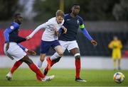 3 May 2019; Cole Palmer of England in action against Lucien Agoume of France during the 2019 UEFA European Under-17 Championships Group B match between England and France at City Calling Stadium in Longford. Photo by Eóin Noonan/Sportsfile