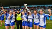 5 May 2019; Garda Jimmy O'Neill, of Clontarf Garda Station, with members of the winning Waterford squad after the Lidl Ladies National Football League Division 2 Final match between Kerry and Waterford at Parnell Park in Dublin. Photo by Ray McManus/Sportsfile