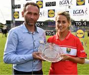 5 May 2019; Paul Lazar, Deputy Store Manager, Lidl Coolock, presents the Player of the Match to Orla Finn of Cork after the Lidl Ladies National Football League Division 1 Final match between Cork and Galway at Parnell Park in Dublin. Photo by Ray McManus/Sportsfile