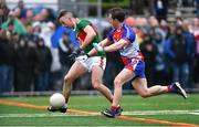 5 May 2019; Evan Regan of Mayo scores his side's first goal as Michael Creegan of New York closes in during the Connacht GAA Football Senior Championship Quarter-Final match between New York and Mayo at Gaelic Park in New York, USA. Photo by Piaras Ó Mídheach/Sportsfile