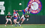 5 May 2019; Niall Madine of New York in action against Matthew Ruane of Mayo, as Paddy Durcan of Mayo and Seán Hurley of New York look on, during the Connacht GAA Football Senior Championship Quarter-Final match between New York and Mayo at Gaelic Park in New York, USA. Photo by Piaras Ó Mídheach/Sportsfile