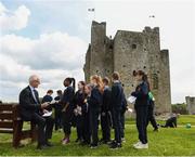 7 May 2019; International team managers Mick McCarthy and Colin Bell visited Trim Castle and the Knightsbrook Hotel today to officially launch the 2019 Football Association of Ireland AGM and Festival of Football. The Royal County will host both events for the first time at the end of July, culminating with the Association’s AGM at the popular Knightsbrook hotel on Saturday, July 27th. All 38 clubs in Meath will receive visits from FAI management, former internationals and coaching staff during the week long festivities. Clubs will also benefit from financial aid and coaching assistance as Meath becomes the 13th host of the Festival of Football which launched in 2007. This year’s Festival is supported by Meath County Council and the Meath Local Sports Partnership. Pictured is Republic of Ireland manager Mick McCarthy signing autographs for 4th class pupils of St Anne's Loreto Primary School, Navan. Photo by Stephen McCarthy/Sportsfile