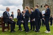 7 May 2019; International team managers Mick McCarthy and Colin Bell visited Trim Castle and the Knightsbrook Hotel today to officially launch the 2019 Football Association of Ireland AGM and Festival of Football. The Royal County will host both events for the first time at the end of July, culminating with the Association’s AGM at the popular Knightsbrook hotel on Saturday, July 27th. All 38 clubs in Meath will receive visits from FAI management, former internationals and coaching staff during the week long festivities. Clubs will also benefit from financial aid and coaching assistance as Meath becomes the 13th host of the Festival of Football which launched in 2007. This year’s Festival is supported by Meath County Council and the Meath Local Sports Partnership. Pictured is Republic of Ireland manager Mick McCarthy signing autographs for 4th class pupils of St Anne's Loreto Primary School, Navan. Photo by Stephen McCarthy/Sportsfile