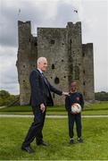 7 May 2019; International team managers Mick McCarthy and Colin Bell visited Trim Castle and the Knightsbrook Hotel today to officially launch the 2019 Football Association of Ireland AGM and Festival of Football. The Royal County will host both events for the first time at the end of July, culminating with the Association’s AGM at the popular Knightsbrook hotel on Saturday, July 27th. All 38 clubs in Meath will receive visits from FAI management, former internationals and coaching staff during the week long festivities. Clubs will also benefit from financial aid and coaching assistance as Meath becomes the 13th host of the Festival of Football which launched in 2007. This year’s Festival is supported by Meath County Council and the Meath Local Sports Partnership. At the launch is Republic of Ireland manager Mick McCarthy with Denzel Boaitey, a pupil of 4th Class in St Anne's Loreto Primary School, Navan, at Trim Castle. Photo by Stephen McCarthy/Sportsfile