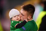 9 May 2019; Ronan McKinley of Republic of Ireland shares a moment with his 1-year-old brother Johnas following the 2019 UEFA European Under-17 Championships Group A match between Belgium and Republic of Ireland at Tallaght Stadium in Dublin. Photo by Stephen McCarthy/Sportsfile