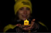 11 May 2019; Thousands of people across 202 locations worldwide walked together in hope against suicide at this year’s Darkness Into Light, proudly supported by Electric Ireland, raising vital funds to ensure Pieta can continue to provide critical support in the fight against suicide. A participant holds a candle at the Darkness Into Light event at Marlay Park in Rathfarnham, Dublin. Photo by Eóin Noonan/Sportsfile