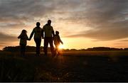 11 May 2019; Thousands of people across 202 locations worldwide walked together in hope against suicide at this year’s Darkness Into Light, proudly supported by Electric Ireland, raising vital funds to ensure Pieta can continue to provide critical support in the fight against suicide. Chris, Linda, Alex, six years, and Ava Lawless, seven years, from Tallaght, Dublin, make their way home as the sun rises after the Darkness Into Light event in the Phoenix Park in Dublin. Photo by Ray McManus/Sportsfile