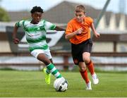 11 May 2019; Ivan Gramminschi of St Kevin's Boys in action against Ike Orazi of Shamrock Rovers during the U12 SFAI Cup Final 2019 match between Shamrock Rovers and St KevinÕs Boys at Oscar Traynor Centre in Dublin. Photo by Michael P. Ryan/Sportsfile