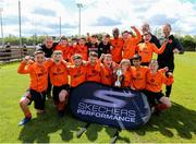 11 May 2019; St Kevin's Boys players and coaches celebrate with the trophy following the U12 SFAI Cup Final 2019 match between Shamrock Rovers and St Kevin's Boys at Oscar Traynor Centre in Dublin. Photo by Michael P. Ryan/Sportsfile