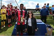 11 May 2019; Regional Manager of Sketchers Gemma McGurk presents the player of the match trophy to Divine Lzekor of Cherry Orchard the U14 SFAI Cup Final match between Belvedere FC and Cherry Orchard at Oscar Traynor Centre in Dublin. Photo by Michael P. Ryan/Sportsfile