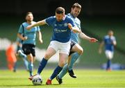 11 May 2019; Craig Walsh of Crumlin United in action against Eoghan Lougheed of Avondale United during the FAI New Balance Intermediate Cup Final match between Avondale United and Crumlin United at Aviva Stadium in Dublin. Photo by Eóin Noonan/Sportsfile
