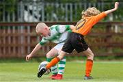 11 May 2019; James Roche of Shamrock Rovers in action against Chris Conlon of St Kevin's Boys during the U12 SFAI Cup Final 2019 match between Shamrock Rovers and St Kevin's Boys at Oscar Traynor Centre in Dublin. Photo by Michael P. Ryan/Sportsfile