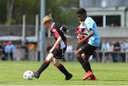 11 May 2019;Samuel Soyemi of Belvedere FC in action against Bobby Pakenham of Cherry Orchard during the U14 SFAI Cup Final match between Belvedere FC and Cherry Orchard at Oscar Traynor Centre in Dublin. Photo by Michael P. Ryan/Sportsfile