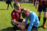 11 May 2019; Adam Murphy of Belvedere FC is consoled by Cian Dunne Byrne of Cherry Orchard at the end of the U14 SFAI Cup Final match between Belvedere FC and Cherry Orchard at Oscar Traynor Centre in Dublin. Photo by Michael P. Ryan/Sportsfile