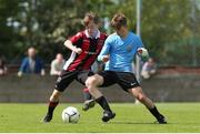 11 May 2019; Adam Murphy of Belvedere FC in action against Jack Murray of Cherry Orchard during the U14 SFAI Cup Final match between Belvedere FC and Cherry Orchard at Oscar Traynor Centre in Dublin. Photo by Michael P. Ryan/Sportsfile