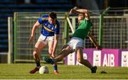 11 May 2019; Conor Sweeney of Tipperary in action against Sean O'Dea of Limerick during the Munster GAA Football Senior Championship quarter-final match between Tipperary and Limerick at Semple Stadium in Thurles, Co. Tipperary. Photo by Diarmuid Greene/Sportsfile