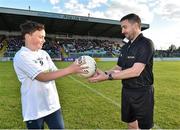 11 May 2019; 11 year old Adam Byrne from Celbridge Co. Kildare presents the match ball to referee Noel Mooney on behalf of Barretstown before the Leinster GAA Football Senior Championship Round 1 match between Wicklow and Kildare at Netwatch Cullen Park in Carlow. Photo by Matt Browne/Sportsfile