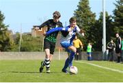11 May 2019; Evan Harte of Stella Maris in action against Mikee Horohan of Hanover Harps during the U15 SFAI Cup Final 2019 match between Stella Maris and Hanover Harps at Oscar Traynor Centre in Dublin. Photo by Michael P. Ryan/Sportsfile
