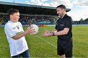 11 May 2019; 11 year old Adam Byrne from Celbridge Co. Kildare presents the match ball to referee Noel Mooney on behalf of Barretstown before the Leinster GAA Football Senior Championship Round 1 match between Wicklow and Kildare at Netwatch Cullen Park in Carlow. Photo by Matt Browne/Sportsfile