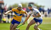 12 May 2019; Keith Smyth of Clare in action against Cathrach Daly of Waterford during the Electric Ireland Munster Minor Hurling Championship match between Waterford and Clare at Walsh Park in Waterford. Photo by Ray McManus/Sportsfile