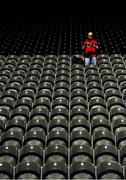 12 May 2019; An early-arriving supporter reads his match programme in the stand prior to the Munster GAA Hurling Senior Championship Round 1 match between Cork and Tipperary at Pairc Ui Chaoimh in Cork. Photo by Diarmuid Greene/Sportsfile