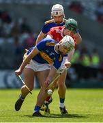12 May 2019; Ed Connolly of Tipperary in action against Jack Cahalane of Cork during the Electric Ireland Munster Minor Hurling Championship match between Cork and Tipperary at Pairc Ui Chaoimh in Cork. Photo by Diarmuid Greene/Sportsfile