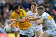 12 May 2019; Shane McEntee of Meath in action against Johnny Moloney, centre, and David Dempsey of Offaly during the Leinster GAA Football Senior Championship Round 1 match between Meath and Offaly at Páirc Tailteann, Navan in Meath. Photo by Brendan Moran/Sportsfile