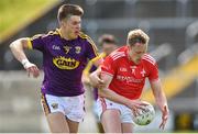 12 May 2019; Jim McEneaney of Louth in action against Eoin Porter of Wexford during the Leinster GAA Football Senior Championship Round 1 match between Wexford and Louth at Innovate Wexford Park in Wexford. Photo by Matt Browne/Sportsfile