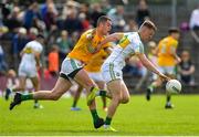 12 May 2019; Peter Cunningham of Offaly in action against Bryan Menton of Meath during the Leinster GAA Football Senior Championship Round 1 match between Meath and Offaly at Páirc Tailteann, Navan in Meath. Photo by Brendan Moran/Sportsfile