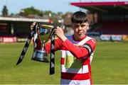 12 May 2019; John Kehir captain of Leixlip United with the trophy following the U13 SFAI Cup Final 2019 match between Douglas Hall and Leixlip United at Turners Cross in Cork. Photo by Michael P. Ryan/Sportsfile
