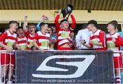 12 May 2019; Leixlip United captain John Kehir lifts the trophy following the U13 SFAI Cup Final 2019 match between Douglas Hall and Leixlip United at Turners Cross in Cork. Photo by Michael P. Ryan/Sportsfile