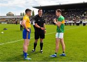 12 May 2019; Referee Sean Hurson with captains Cathal Cregg of Roscommon and Micheal McWeeney of Leitrim during the coin toss prior to during the Connacht GAA Football Senior Championship Quarter-Final match between Roscommon and Leitrim at Dr Hyde Park in Roscommon. Photo by Seb Daly/Sportsfile