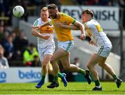 12 May 2019; Michael Newman of Meath is tackled by Niall Darby, left, and Johnny Moloney of Offaly during the Leinster GAA Football Senior Championship Round 1 match between Meath and Offaly at Páirc Tailteann, Navan in Meath. Photo by Brendan Moran/Sportsfile
