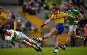 12 May 2019; Niall Kilroy of Roscommon shoots to score his side's third goal of the game past Cathal McCrann of Leitrim during the Connacht GAA Football Senior Championship Quarter-Final match between Roscommon and Leitrim at Dr Hyde Park in Roscommon. Photo by Seb Daly/Sportsfile